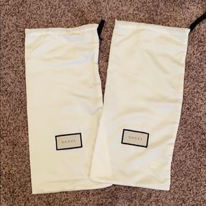 One pair of Gucci dust bags